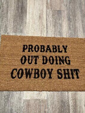 PROBABLY OUT DOING COWBOY SHIT decorative coir doormat